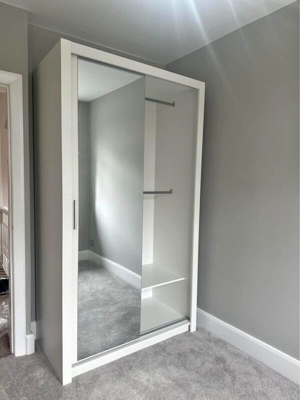 Compact sliding door wardrobes for small bedrooms