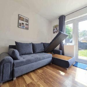 L-shaped corner sofa UK grey fabric left hand facing”