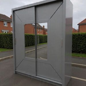 grey fitted wardrobe with sliding doors and mirror panels
